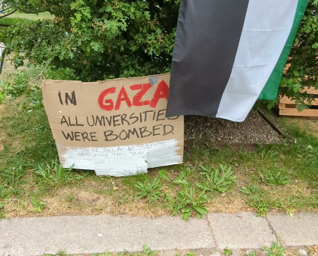 Poster "In GAZA ALL UNIVERSITIES WERE BOMBED"